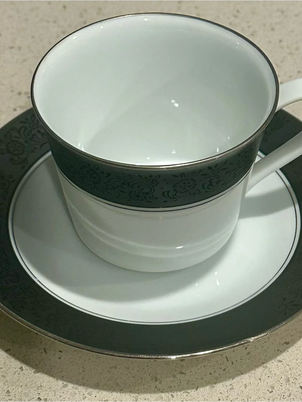 Noritake White Porcelain Teacup and Saucer Silver Trim